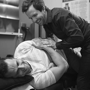 Chiropractor treating back pain at Vitality Chiropractic Perth